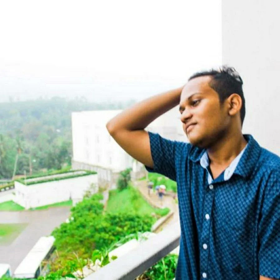An early portrait of Sayuru Akash Amarasinghe by a window